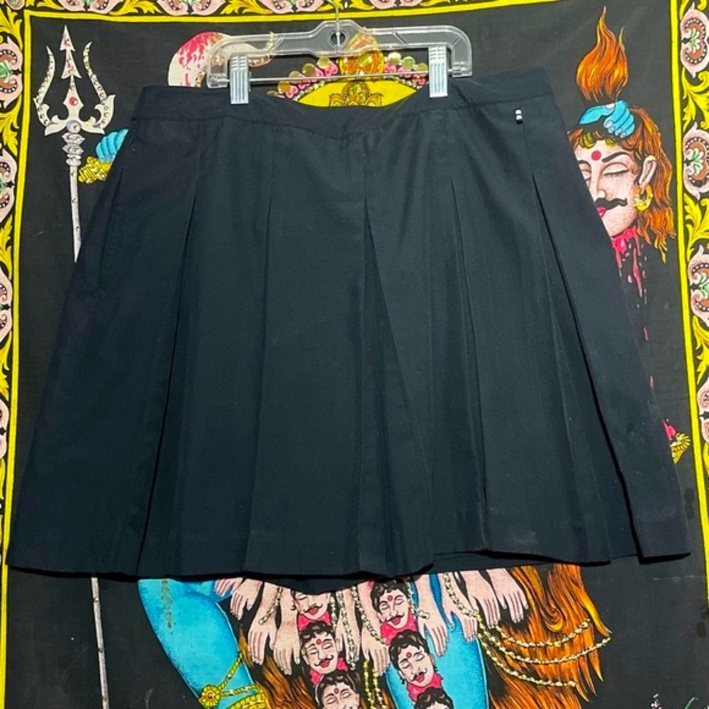 Vintage Izod Golf tennis skort with pockets.